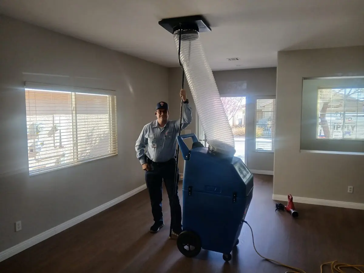 Professional Dryer Vent Cleaning work inside a Pacific home